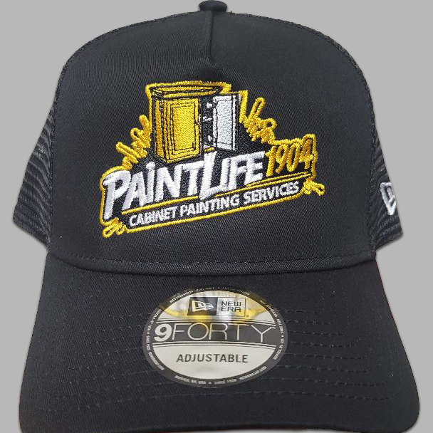 Black cap with 'Paint Life 1904' embroidery on a gray background